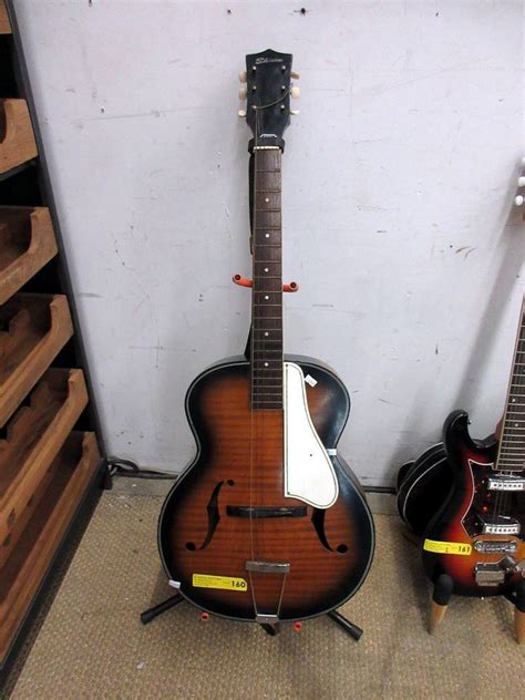 One of the finest <b>guitars</b> to ever carry the <b>Silvertone</b> (or Harmony) name, this <b>archtop</b> boasts a 16 1/2" lower bout width, 2 3/4" body depth, and a natural <b>acoustic</b> tone that's bright and percussive. . Silvertone archtop acoustic guitar